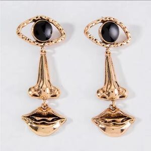Gold and Black Eye Earrings Face